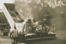 alsphalt paving machine, dumptruck, workers