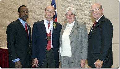 left to right: Bill Jones, Tim Lomax, Jeannine Lomax, and John White