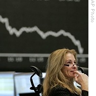 Broker Simone Wallmeyer seen under curve of German stock index DAX at stock market in Frankfurt, Germany, 14 Jan 2009<br />