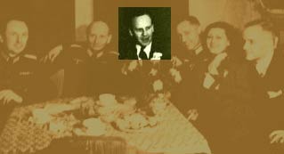 Oskar Schindler (third from left) at a party with local SS officials on his 34th birthday. Schindler attempted to use his connections with German officials to obtain information that might protect his Jewish employees. Krakow, Poland, April 28, 1942.