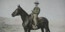 John Otto on a trail with his horse and burro