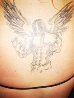 Tattoo of angel on her back