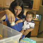 Photo of mother packing food supplies