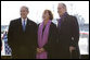 President George W. Bush stands with his sister, Doro Bush Koch, and their father, former President George H. W. Bush at the commissioning ceremony of the USS George H. W. Bush (CVN 77) aircraft carrier Saturday, Jan 10, 2009 in Norfolk, Va. White House photo by Eric Draper