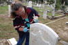 Workshop participant Cindi Giametta applies a poultice to iron stained marble. (Mary Striegel)