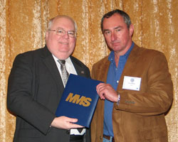 Terry Hollier, Houma District, receives the 2008 Offshore MMS Inspector Award from Associate Director Chris Oynes