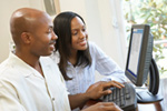 Couple looking at computer screen