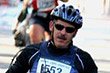Marine Chief Warrant Officer 4 Chris Hedgcorth participates in the 33rd Marine Corps Marathon in Washington, D.C., Oct. 26, 2008. He completed the 26.2 miles on a hand cycle as part of a fundraising effort for other wounded servicemembers. Courtesy photo by Nicole Benitez