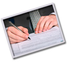 Close up of person filling out form