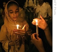 Indian Muslim girl takes part in  candle march to condemn terrorist attacks and in memory of those killed, in Mumbai, 30 Nov 2008