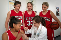 Female athlete receives vaccination