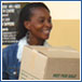 Woman receiving basic care package in Uganda 