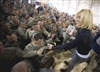 American Idol contestant and country musician Kellie Pickler signs autographs for soldiers, Dec. 17,  after performing with the 2008 USO Holiday Tour at Forward Operating Base Sharana, Afghanistan. 