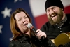 Comedian Kathleen Madigan and musician Zack Brown entertain troops stationed at Kandahar, Afghanistan, Dec. 17, during the  2008 USO Holiday Tour. 