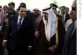 King Abdullah of Saudi Arabia, right, talks with Egyptian President Hosni Mubarak, left, after his arrival in Riyadh, Saudi Arabia, Tuesday, 13 Jan. 2009