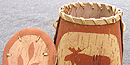 A Passamaquoddy birchbark basket with the image of a moose on it