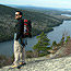 Hiker surveys the landscape high above Long Pond.