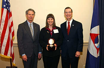 Elizabeth A. Blair (center) accepts the 2005 NOAA Award for Excellence in Coastal Zone Management