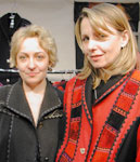 Latvian sisters Sarmite Svilis and Daiga Henson at a craft show wearing their designer jackets