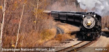 Steamtown National Historic Site: A steam locomotive, built in 1923, rounds a corner in the beautiful Pocono Mountains of Northeastern Pennsylvania.