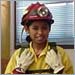 Navajo girl dressed in firefighter's clothes at and Boys and Girls Club program
