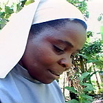 Sister Florence Nawanga grows artemesia near Entebbe