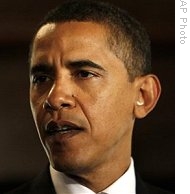 Barack Obama talks to reporters in Washington, 12 Jan 2008