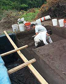 Archeologist excavating at Buckeye Knoll, near Victoria, Texas