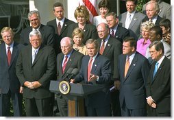 President George W. Bush announces the Homeland Security Strategy as Vice President Cheney and Governor Ridge stand beside the President during a Rose Garden press conference Tuesday, July 16.