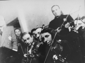 Violinists perform in the Kovno ghetto orchestra.