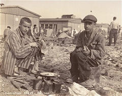 Two survivors at Dachau.