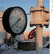 A gas pressure gauge is seen at a snow-covered transit point on the main pipeline from Russia in the village of Boyarka, near Kyiv, Ukraine, 06 Jan 2009