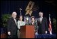 Vice President Dick Cheney and Commerce Secretary Carlos Gutierrez, far right, stand with representatives of The Bama Companies, Inc., which is one of four companies awarded the Malcolm Baldrige National Quality Award during a ceremony in Washington, D.C., Tuesday, July 20, 2005. White House photo by Paul Morse