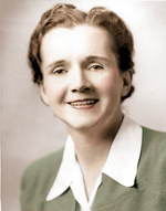 Photo: portrait of  a smiling Rachel Carson, colorized .