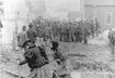 Women pulling their supplies through the streets of Skagway, Alaska