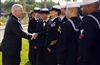 U.S. Defense Secretary Robert M. Gates talks with U.S. Navy sailors at U.S. Naval Forces Central Command Headquarters in Manama, Bahrain, Dec. 12, 2008. 