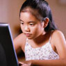 Young girl using a computer
