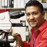 Man working with mircroscope