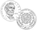 2009 Abraham Lincoln Commemorative Silver Dollar with obverse of President Lincoln with the inscriptions LIBERTY, IN GOD WE TRUST and 2009 and Reverse features the last 43 words of the Gettysburg Address, encircled in a laurel wreath, a curling banner with Lincoln's signature, and the inscriptions UNITED STATES OF AMERICA, ONE DOLLAR and E PLURIBUS UNUM.