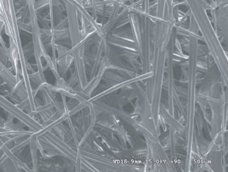 Figure 2. Scanning electron microscope image of a polyester-glass fiber filter.