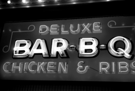 Photograph of a BBQ restaurant sign.