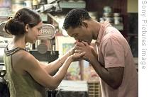 Rosario Dawson and Will Smith in scene from Seven Pounds