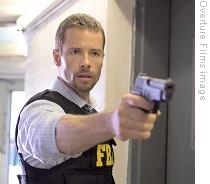 Guy Pearce in scene from Traitor