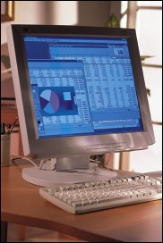 A computer with graphs and statistics on the screen.