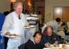 Photo of Secretary Kuperus serving lunch at Bethel Soup Kitchen