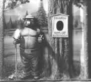 Black and white photo of vintage Smokey Bear.