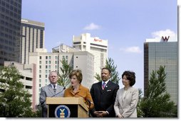 Mrs. Laura Bush, flanked by Mark Sanders, GM of Marriott Hotels, Marc Morial, President and CEO of the National Urban League, and Labor Secretary Elaine Chao, announces a $20 million dollar grant to the National Urban League in New Orleans, La., Monday, April 10, 2006, for their Youth Empowerment program to help at-risk youth find stable employment, as part of the Helping America's Youth initiative. White House photo by Shealah Craighead