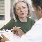 Photo: Woman consulting with her healthcare professional.