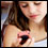 Photo: A girl reading a text message