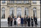 Mrs. Laura Bush stands outside Elysee Palace with other first lady attendees at the Conference on Missing and Exploited Children in Paris Wednesday, Jan. 17, 2007. The conference is hosted by Madame Bernadette Chirac, pictured in the center. White House photo by Shealah Craighead